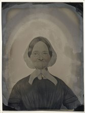 Portrait of old woman with glasses; United States; 1860s - 1880s; Hand-colored tintype; Sheet: 21.3 x 16.2 cm, 8 3,8 x 6 3,8 in