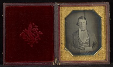 Portrait of Young Man Holding Map of Mexico; Mexico; late 1840s–early 1850s; Daguerreotype
