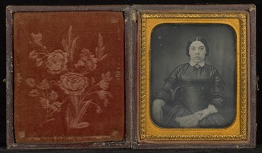 Portrait of a Woman in a Black Dress Seated and Holding a Fan; Mexico; 1856; Hand-colored Daguerreotype