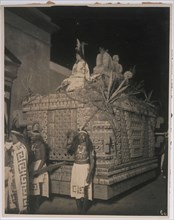 Parade float representing a precolumbian altar with Chac Mool on top, Photographs relating to early 20th century Mexican history