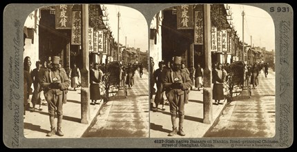 Rich native bazaars on Nankin Road, principal Chinese street of Shanghai, China, Ricalton, James, Underwood and Underwood