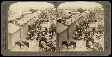 Motley crowd and jumbled huts of old Tientsin- view soon after city was occupied- China, Ricalton, James, Underwood
