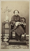 Seated Chinese woman; recto, collection of photographs of China and Southeast Asia, Nam-Ting, ca. 1860