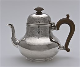Silver teapot with brown wooden handle in bud on lid, teapot tableware holder silver wood, engraved pear shaped body on