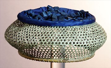 Round children's hat, woven net structure of reeds, topside blue silk with six parts pleated blue ribbon, falcon hat headgear