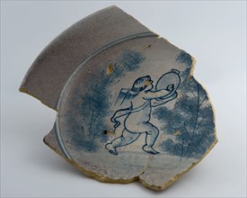 Fragment of the dish, yellow shard, decorated in white and blue, with representation of putto with jug, dish crockery holder