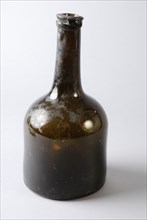 Cylindrical bottle, bottle holder bottomfound glass cork, hand-blown glass application Cylindrical bottle in clear brown-green