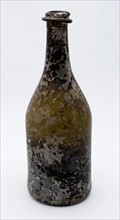 Cylindrical bottle, bottle holder soil found glass, hand-blown glass application Cylindrical bottle in clear light green glass