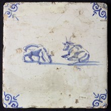 Animal tile, lying and grazing ox, in blue on white, corner motif oxenkop, wall tile tile sculpture ceramic earthenware glaze