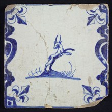 Animal tile, jumping buck to the right on ground between balusters, in blue on white, corner pattern french lily, wall tile