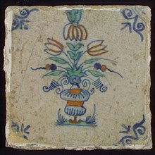 Tile, flowerpot in blue, green and orange on white, corner motif oxen head, wall tile tile sculpture ceramic earthenware glaze