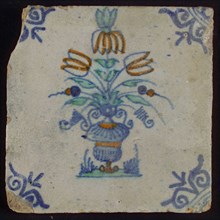 Tile, flower pot in blue, green and orange on white, corner motif oxen head, wall tile tile sculpture ceramic earthenware glaze