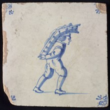 Occupation tile, blue with man with basket or rack on the back, corner motif ox's head, wall tile tile sculpture ceramic