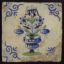 Tile, flower pot in blue, purple and green on white, corner motif big ox head, wall tile tile sculpture ceramic earthenware