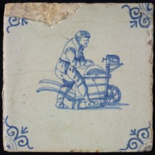 Occupation tile, blue with shear blade, corner motif oxen head, wall tile tile sculpture ceramic earthenware glaze wood, baked