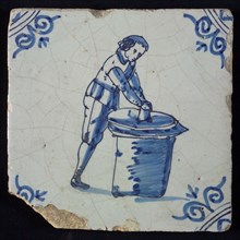 Occupation tile, blue with paint maker or potter, corner motif of ox's head, wall tile tile sculpture ceramic earthenware glaze