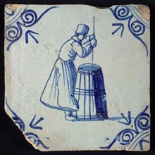 Occupation tile, blue with churning woman, corner motif ox's head, wall tile tile sculpture ceramic earthenware glaze, baked 2x