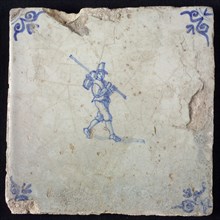 Occupation tile, blue with man with stick and bucket, top hat, corner pattern, ox's head, wall tile tile sculpture ceramic