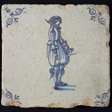 Occupation tile, blue with standing nobleman, corner motif ox's head, wall tile tile sculpture ceramic earthenware glaze, baked