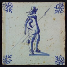 Occupation tile, blue with man with staff and horn In his hands, corner pattern ox's head, wall tile tile sculpture ceramic