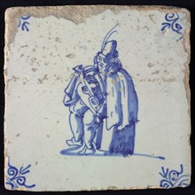 Figure tile, blue with seated man with musical instrument, corner motif ox's head, wall tile tile sculpture ceramic earthenware