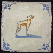 Animal tile, greyhound to the right in blue and brown on white, corner motif ox's head, wall tile tile sculpture ceramic