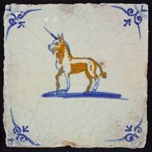 Animal tile, unicorn left in blue and brown on white, corner motif ox's head, wall tile tile sculpture ceramic earthenware glaze