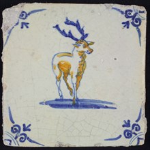 Animal tile, deer to the right in blue and brown on white, corner motif ox's head, wall tile tile sculpture ceramic earthenware
