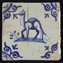 Animal tile, dromedary left on ground, in blue on white, corner design large ox head, wall tile tile sculpture ceramic