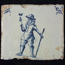 Occupation tile, blue with bricklayer with crowned trowel, big hat and lace collar, corner pattern ox head, wall tile