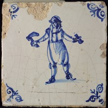 Occupation tile, blue with man pickaxe, corner motif ox's head, wall tile tile sculpture ceramic earthenware glaze wood, baked