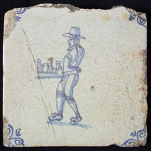 Occupation tile, blue with hawker with chest with jars, medicines, Corner motif, ox-head, wall tile tile sculpture ceramic