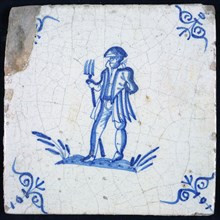 Figure tile, blue with soldier (warrior) with trident on ground, corner pattern ox head, wall tile tile sculpture ceramic