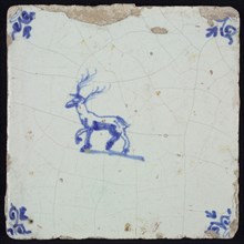 Animal tile, stepping deer to the left, in blue on white, corner motif oxen head, wall tile tile sculpture ceramic earthenware