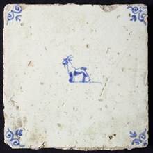 Animal tile, standing goat to the left, in blue on white, corner motif; ox head, wall tile tile sculpture ceramic earthenware