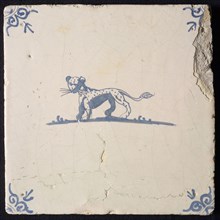 Animal tile, running panther to the left, in blue on white, corner motif; ox head, wall tile tile sculpture ceramic earthenware