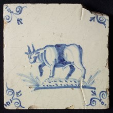 Animal tile, running ox to the left on plot, in blue on white, corner patterned ox head, wall tile tile sculpture ceramic