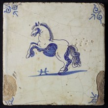Animal tile, rearing horse to the left, in blue on white, corner motif oxen head, wall tile tile sculpture ceramic earthenware