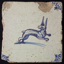 Animal tile, jumping hare to the right, in blue on white, corner motif oxen head, wall tile tile sculpture ceramic earthenware