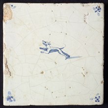 Animal tile, jumping dog to the left, in blue on white, corner motif spider, wall tile tile sculpture ceramic earthenware glaze