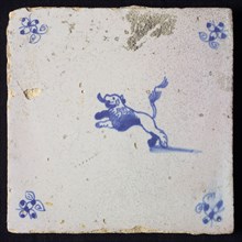 Animal tile, leaping lion to the left, in blue on white, corner motif spider, wall tile tile sculpture ceramic earthenware glaze