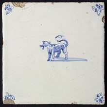 Animal tile, standing panther to the left, in blue on white, corner motif spider, wall tile tile sculpture ceramic earthenware