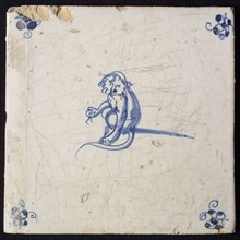 Animal tile, sitting monkey to the right with an unknown object in one leg, in blue on white, corner motif spider, wall tile
