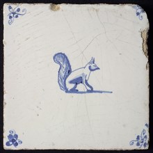 Animal tile, sitting squirrel to the right, in blue on white, corner motif spider, wall tile tile sculpture ceramic earthenware
