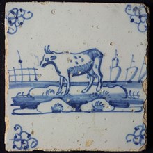 Animal tile, standing ox to the left on continuous plot, three sailing ships in the background, in blue on white, corner motif