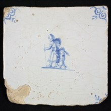 Figure tile, blue with woman and child, walking on the go, corner motif ox's head, wall tile tile sculpture ceramic earthenware