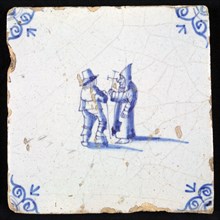 Figure tile, blue with man with stick and monk with cross, corner motif ox's head, wall tile tile sculpture ceramic earthenware