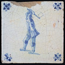 Occupation tile, blue with lumberjack, Man with raised ax, corner pattern spider, wall tile tile sculpture ceramic earthenware