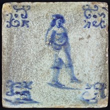 Occupation tile, blue with running man, corner motif voluut, wall tile tile sculpture ceramic earthenware glaze, baked 2x glazed
