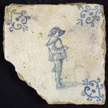 Occupation tile, blue with standing nobleman with big hat, corner pattern volute, wall tile tile sculpture ceramic earthenware